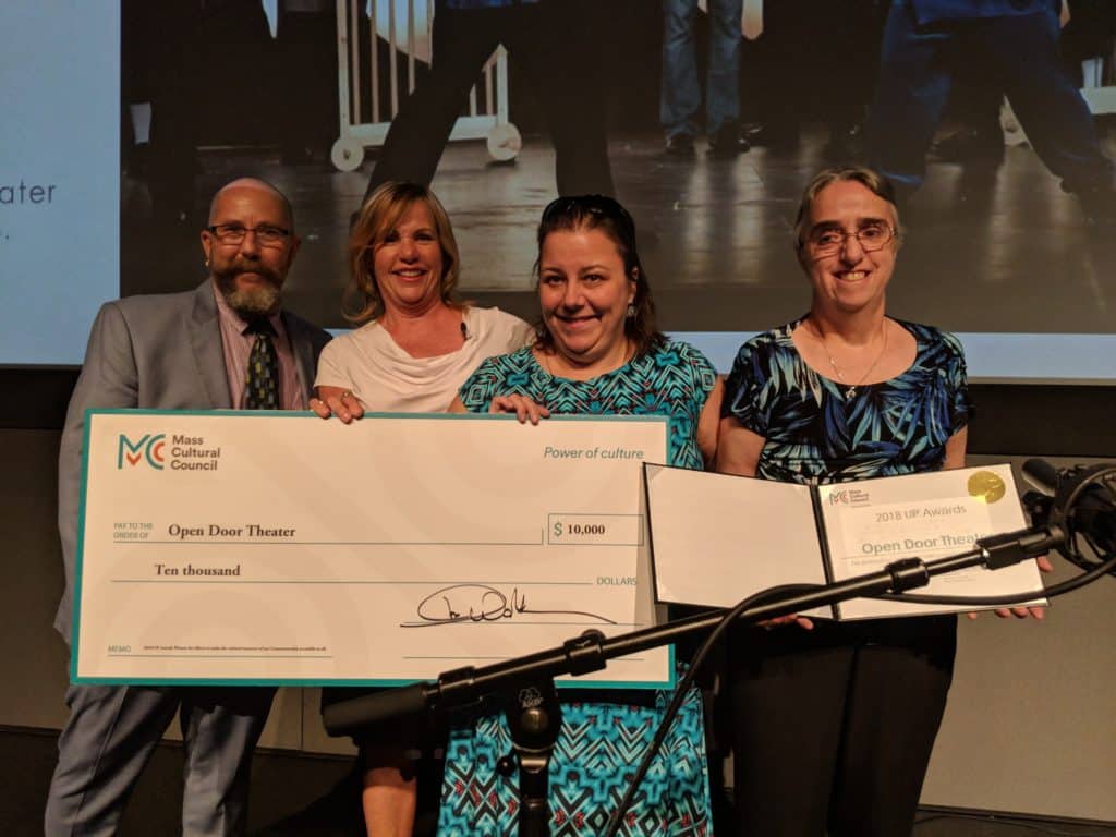 Sam Gould and Janice Smith accepting the 2018 UP Award